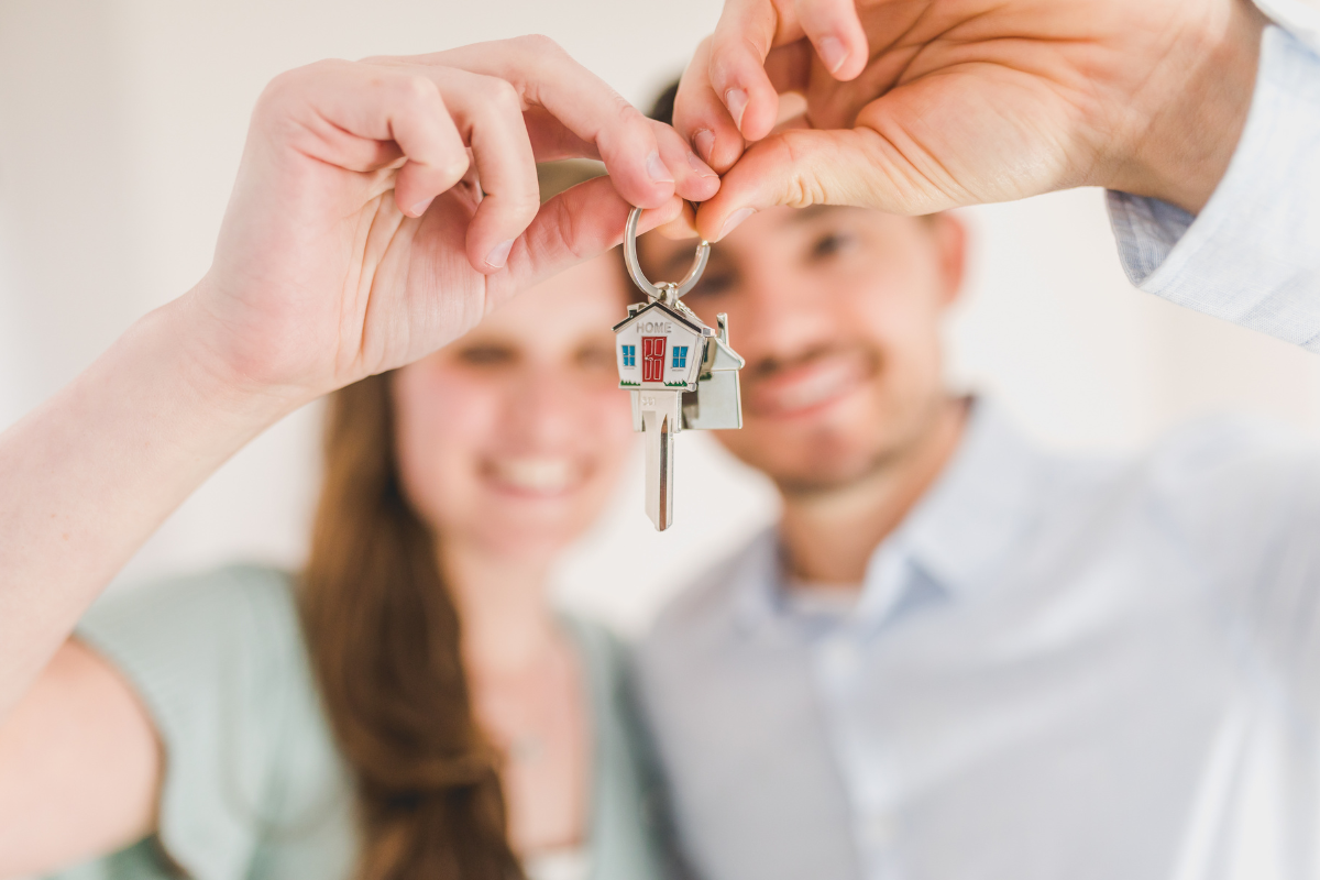 first time buyers keys Couple on a bus tour in London, navigating their financial future